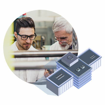 Two men in a lab looking at a thing